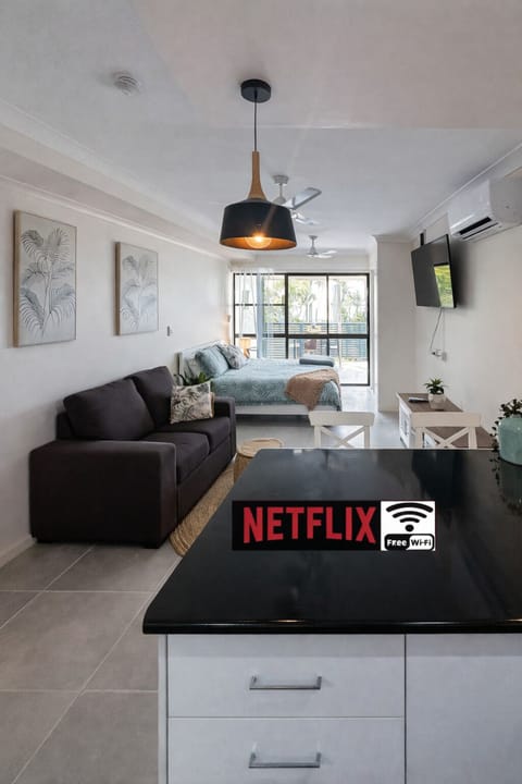 A digital photograph showcases an open concept liv