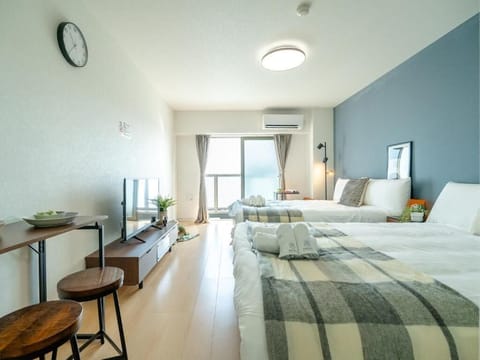 Family Room, Non Smoking, City View | Blackout drapes, soundproofing, iron/ironing board, free WiFi