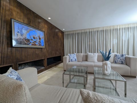Deluxe Villa | Living area | Flat-screen TV, fireplace