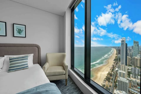 Wake up to sweeping coastal views from the comfort of the king bed