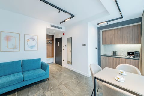 Deluxe Studio | Living area | 42-inch Smart TV with digital channels