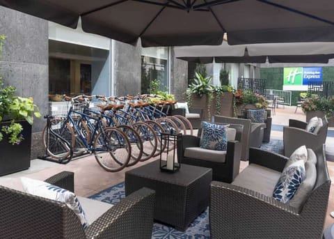 Covered patio with bike rack and lounge seating