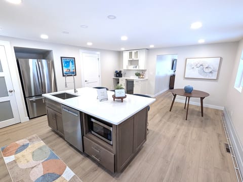 KITCHEN:  The home has a big and beautiful kitchen with all appliances including a dish washer, coffee bar, food pantry, and separate beverage cooler