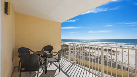 Clearwater 2C - Spacious balcony featuring a new outdoor dining table and chairs with views of the white sands and the beach.