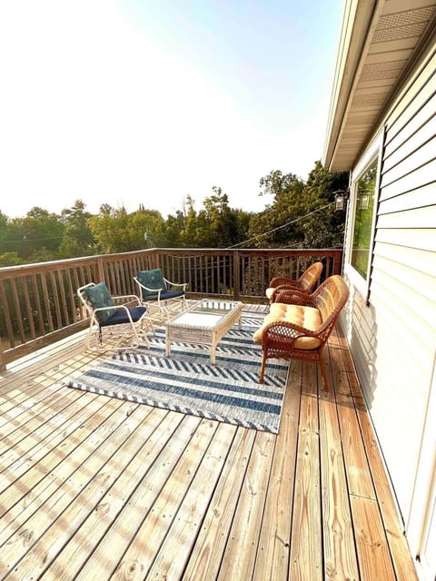 Deck sitting area. Watch sunsets and view of lake