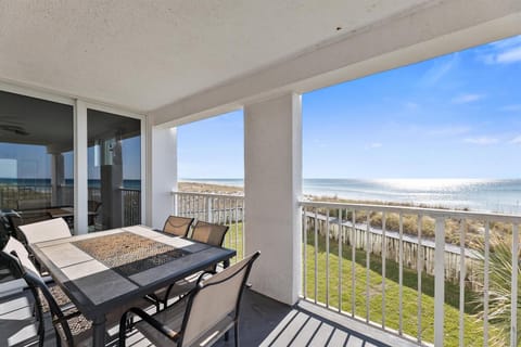 Your private balcony offers stunning oceanfront views where you can dine alfresco while watching waves meet the shore.