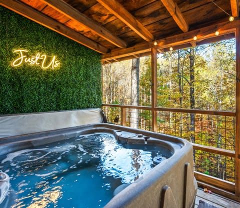 Relax in your private hot tub surrounded by wooded views and a quiet, tucked-away setting