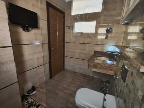 Shower, towels, soap, shampoo