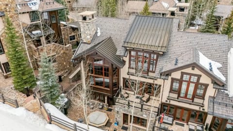 From above, you see it all: ski run steps away, hot tub steaming on the patio, snowmelt keeping paths clear, windows catching light. This is Village Walk luxury — positioned perfectly.