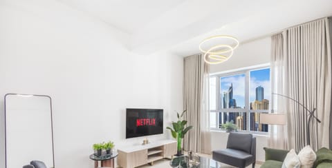 Apartment, City View | Living area | Flat-screen TV