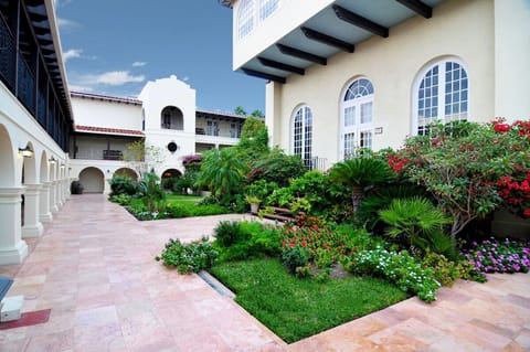Stroll through a lush courtyard garden for instant calm.