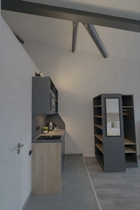 Deluxe Double Room, Kitchenette | Desk, laptop workspace, blackout drapes, soundproofing