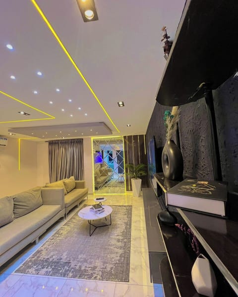 Deluxe Room, Balcony, City View | Living area