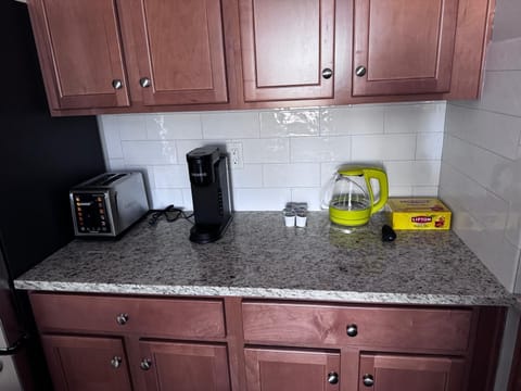 Kitchen: Enjoy brewing morning coffee with top-notch appliances and a stylish granite countertop!