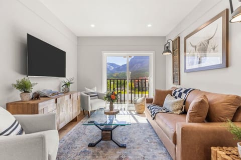 Enjoy the stunning views of the mountains from the comfort of the living area.