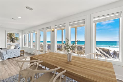 Your morning coffee tastes even better with stunning ocean views stretching endlessly beyond floor-to-ceiling windows.