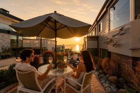 This sunlit patio offers a serene setting for morning coffee or sunset gatherings.