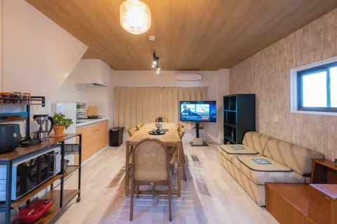 Family Villa, 3 Bedrooms, Private Bathroom | Living area | 55-inch Smart TV with digital channels, video-game console, Netflix