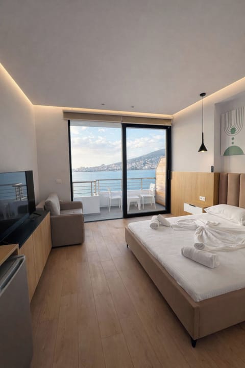 Deluxe Double Room, Balcony, Sea View | Iron/ironing board (on request), bed sheets