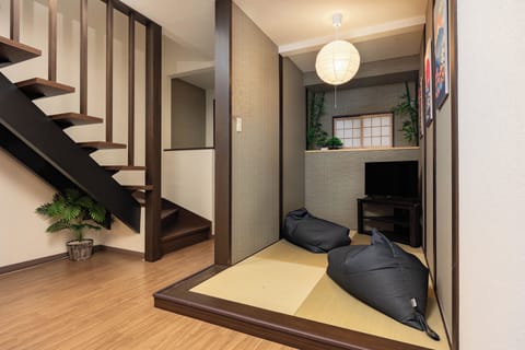 Deluxe House, Balcony | Blackout drapes, iron/ironing board, free WiFi