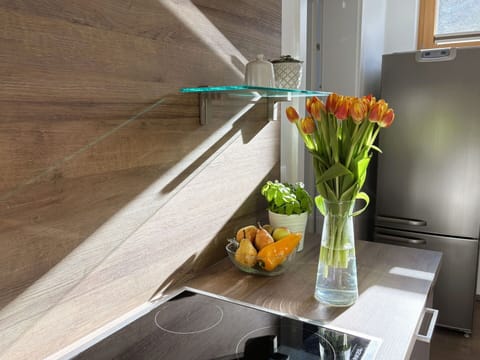 Flooring, Wood, Interior Design, Floor, Furniture, Kitchen, Cabinetry, Countertop, Wood Stain, Home Appliance