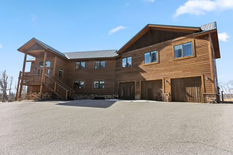 Exterior: On-site parking for 6 cars (3 in garage, 3 in driveway)