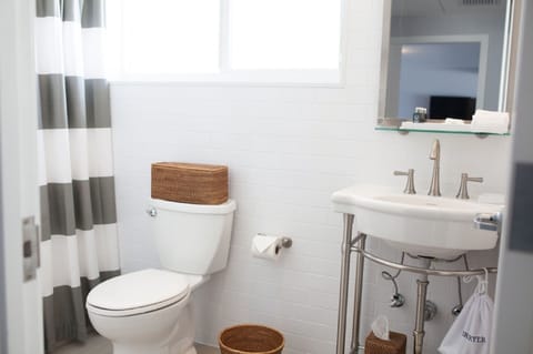 Shower, designer toiletries, hair dryer, bathrobes