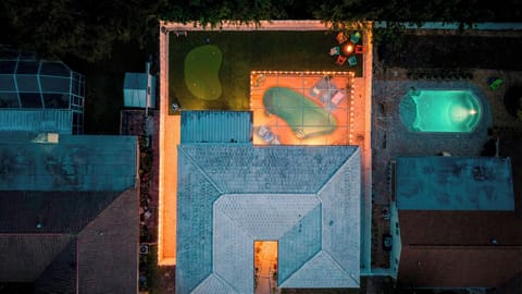 Fully fenced yard with ambient night time lighting