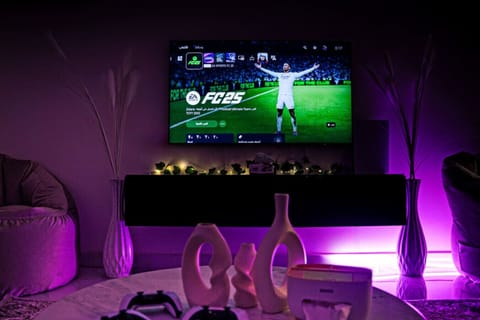 Game Room TV, Sofas, Coffee Table, PS5