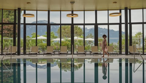 Indoor pool, outdoor pool, pool umbrellas, sun loungers