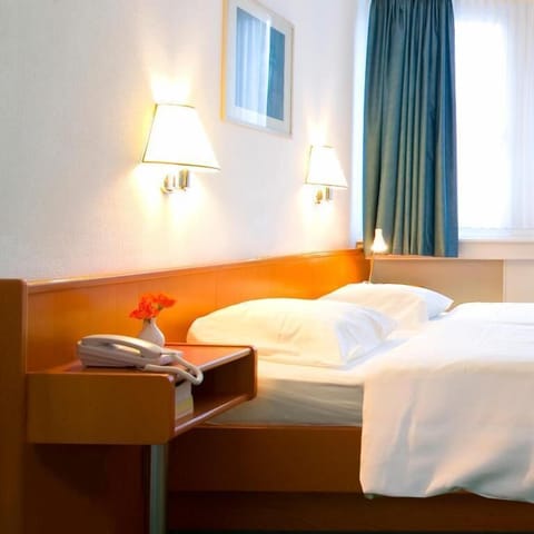 Classic Double Room, City View | In-room safe, iron/ironing board, free WiFi