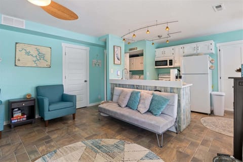 Gather in the living room with access to the upper deck