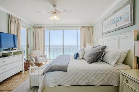 Master bedroom with king bed and beach view