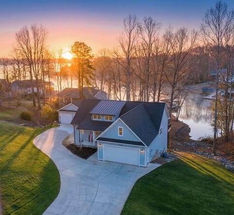 A spacious lakeside home on a quiet cove.  Your private home base for lake days, hot tub evenings and fire pit nights.