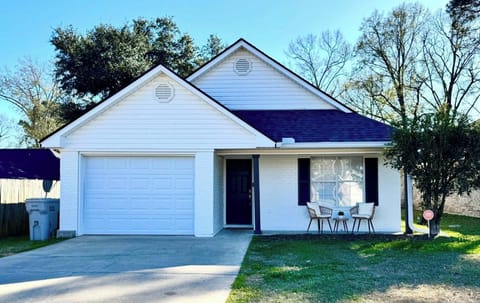 Welcome to The White Magnolia — a clean, cozy retreat in a quiet neighborhood.