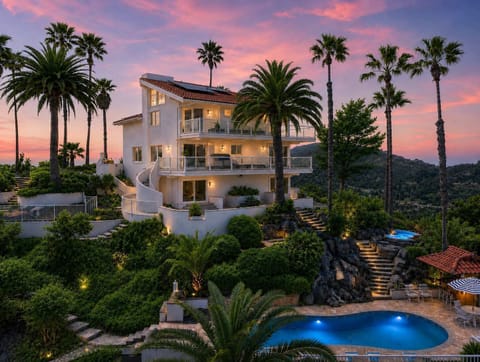 KING OF THE MOUNTAIN! A 6000 sq ft property unlike no other. Sitting on 17 acres, this gated estate offers 360° views and unforgettable sunsets. With luxury amenities and a gorgeous pool, it’s the perfect blend of style, comfort, and serenity.