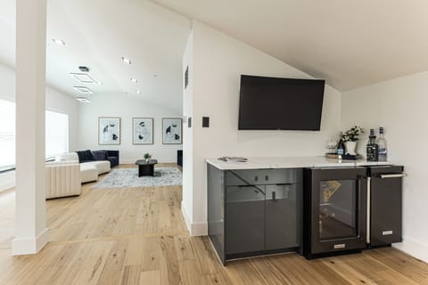 Living Area | Dry Bar | Smart TVs | Electric Fireplace