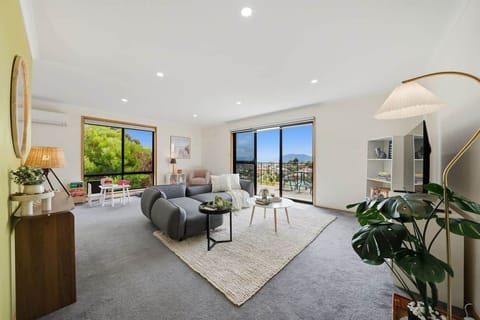 Spacious living room with comfortable seating and a relaxed, welcoming feel.