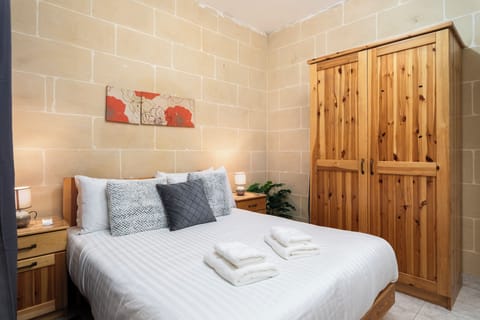 Apartment, City View | Blackout drapes, iron/ironing board, free WiFi