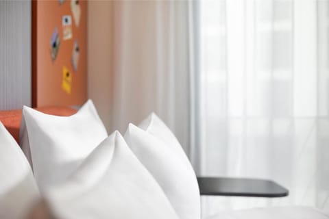 Hypo-allergenic bedding available, minibar (free items), in-room safe