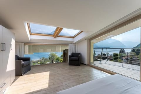 Deluxe Apartment, Lake View | In-room safe, blackout drapes, soundproofing, iron/ironing board