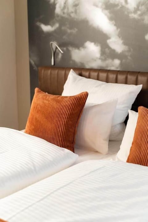 In-room safe, laptop workspace, blackout drapes, soundproofing