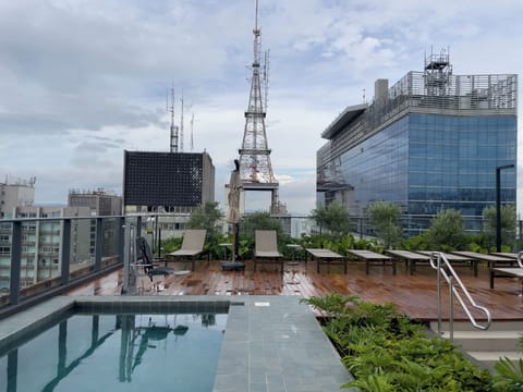 Outdoor pool, pool umbrellas, sun loungers