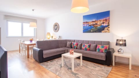 A bright and welcoming living area, perfect for relaxing after a day exploring the city or enjoying a quiet evening in.

#ModernLiving #UrbanComfort #StylishStay #LovelyStay