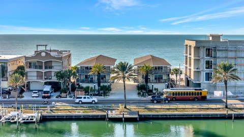 Waterfront street with docks and coastal charm