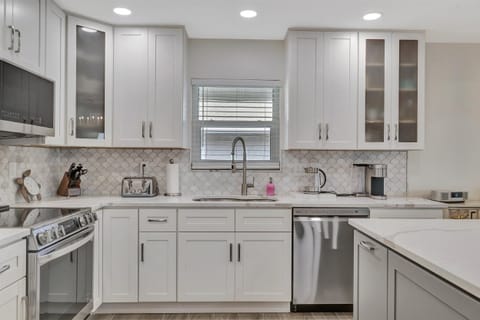 Clean kitchen sink with stylish backsplash