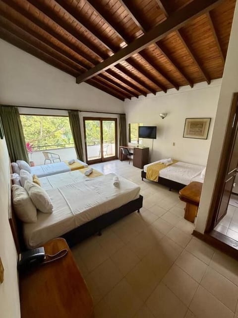 Superior Triple Room, Balcony, Garden View | Desk, laptop workspace, free WiFi