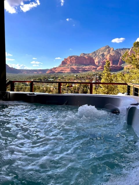 Bubbling hot tub with great red rock views