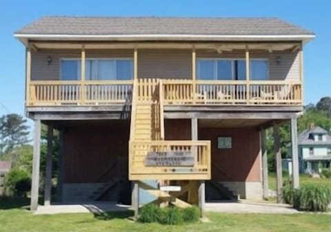 Located on Eastside across from the public boat launch