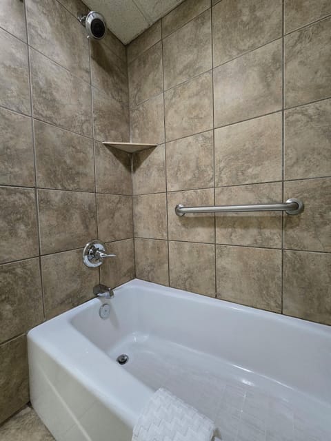 Combined shower/tub, hair dryer, towels, soap